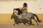 woman rides Lusitano
