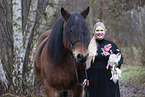 Woman with Papillon and Mecklenburg cold blood