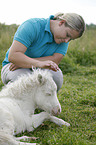 woman and Miniature Shetland Pony foal