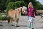 girl and Mini Shetland Pony