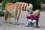 girl and Mini Shetland Pony