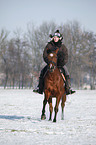 woman rides horse
