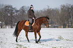 woman rides horse