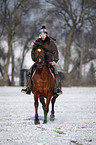 woman rides horse