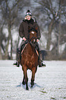 woman rides horse