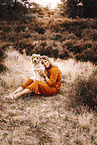 woman with mongrel