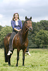 woman rides New Forest Pony