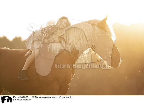girl rides Noriker / VJ-02627