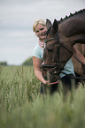 woman and Oldenburg Horse