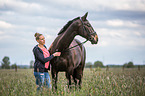 woman and Oldenburg Horse