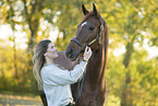 woman and  Oldenburg Horse