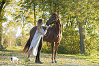 woman and  Oldenburg Horse