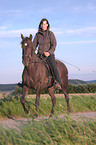woman rides Paso Fino