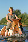 woman rides Pinto