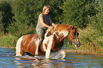 woman rides Pinto