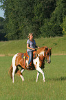 woman rides Pinto