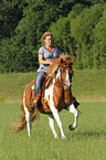 woman rides Pinto