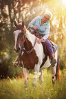 woman rides Pinto