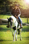 woman rides Pinto-Hunter