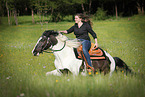 woman rides Pinto-Hunter