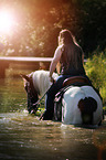 woman rides Pinto-Hunter