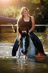 woman rides Pinto-Hunter