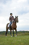 woman rides polish arabian horse