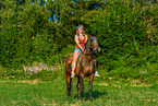 woman rides Polish Warmblood