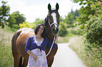 woman and Polish Warmblood