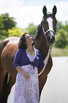 woman and Polish Warmblood