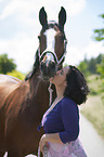 woman and Polish Warmblood