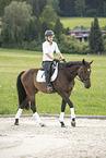 woman rides Polish Warmblood