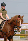 girl rides pony