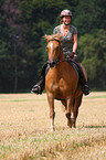 woman rides Pony