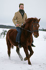 man rides pony