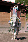 girl learns riding