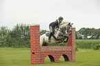 girl rides pony