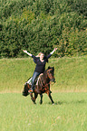 woman rides pony