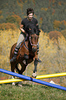 woman rides crossbreed