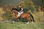 woman rides crossbreed