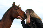woman is kissing PRE