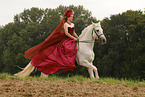 woman is riding a Pura Raza Espanola