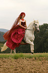 woman is riding a Pura Raza Espanola