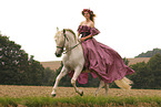 woman is riding a Pura Raza Espanola