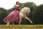 woman is riding a Pura Raza Espanola