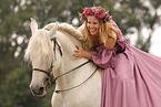 woman is riding a Pura Raza Espanola