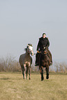 woman rides Quarter Horse