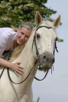 woman rides Quarter Horse