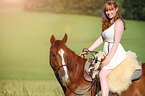 woman rides Quarter Horse