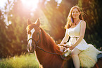 woman rides Quarter Horse